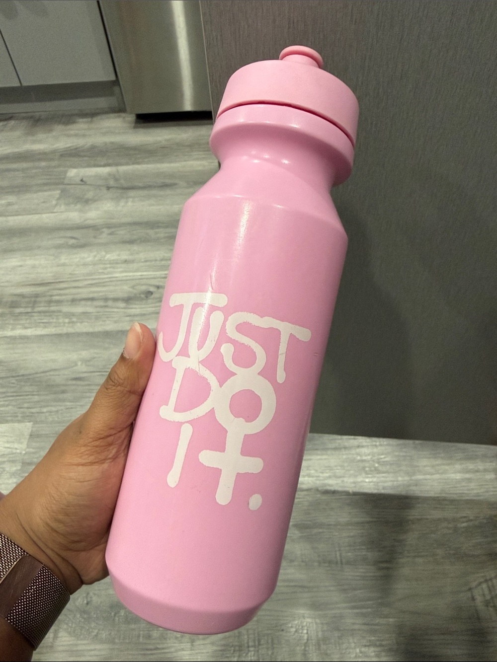 Nike Pink Sports Water Bottle with White 'Just Do It.' Logo